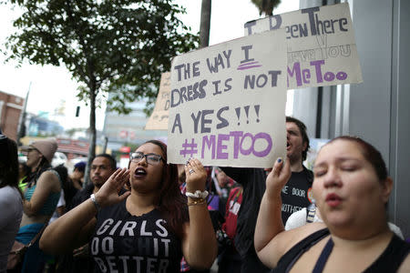 People participate in a protest march for survivors of sexual assault and their supporters in Hollywood, Los Angeles, California U.S. November 12, 2017. REUTERS/Lucy Nicholson