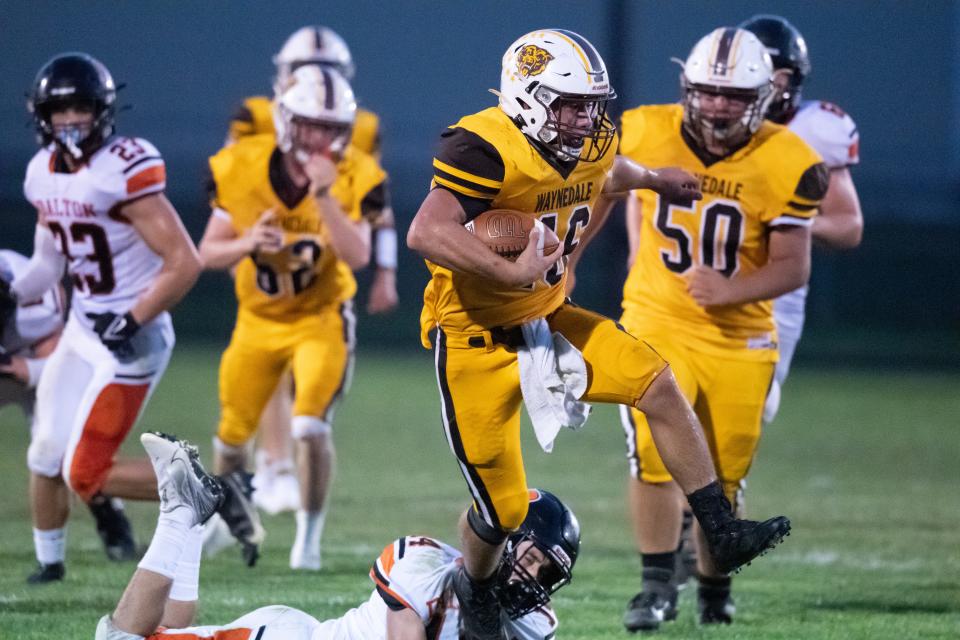 Waynedale's Justin Hershberger stomps into open field.