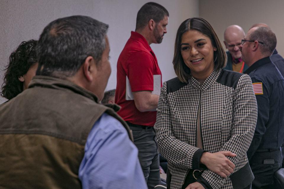 City Councilor Johanna Bencomo (district 4) chats with U.S. Sen. Ben Ray Luján on Jan. 10, 2023, after a presentation about where LCFD would spend federal dollars.