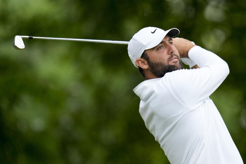 Scottie Scheffler watches his tee shot on the 11th hole during the second round of the PGA Championship.