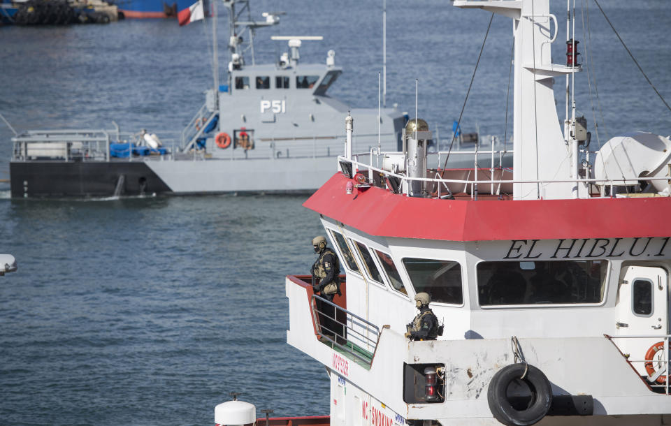 Armed forces stand onboard the Turkish oil tanker El Hiblu 1, which was hijacked by migrants, in Valletta, Malta, Thursday March 28, 2019. A Maltese special operations team on Thursday boarded a tanker that had been hijacked by migrants rescued at sea, and returned control to the captain, before escorting it to a Maltese port. (AP Photo/Rene' Rossignaud)