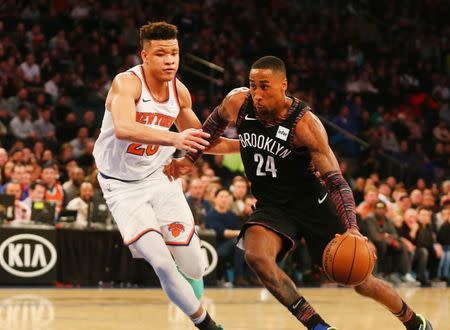 Dec 8, 2018; New York, NY, USA; Brooklyn Nets forward Rondae Hollis-Jefferson (24) dribbles the ball against New York Knicks forward Kevin Knox (20) during the second half at Madison Square Garden. Andy Marlin-USA TODAY Sports
