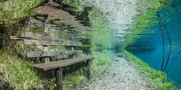 Benches and pathways are completely submerged by the regular flooding phenomenon.