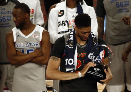 Feb 19, 2017; New Orleans, LA, USA; Western Conference forward Anthony Davis of the New Orleans Pelicans (23) celebrates winning the MVP in the 2017 NBA All-Star Game at Smoothie King Center. Mandatory Credit: Derick E. Hingle-USA TODAY Sports