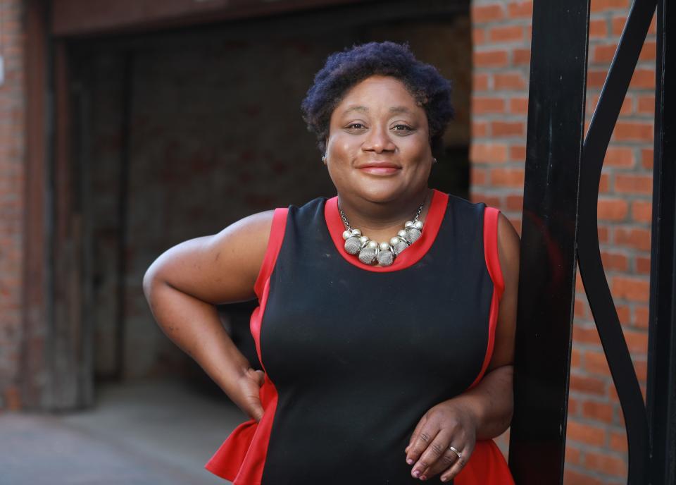 Columbus Dispatch editorial page editor and community engagement editor Amelia Robinson outside the 62 E. Broad St. newsroom on Monday, Nov. 8, 2021.