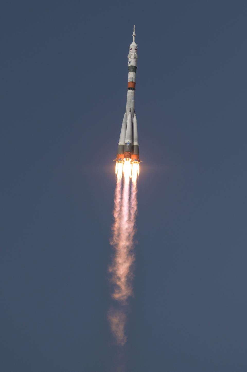 In this image provided by NASA, the Soyuz MS-18 rocket is launched with NASA astronaut Mark Vande Hei, Roscosmos cosmonauts Pyotr Dubrov and Oleg Novitskiy, Friday, April 9, 2021, at the Baikonur Cosmodrome in Kazakhstan. The Russian-U.S. trio of space travelers launched successfully Friday, heading for the International Space Station.(Bill Ingalls/NASA via AP)