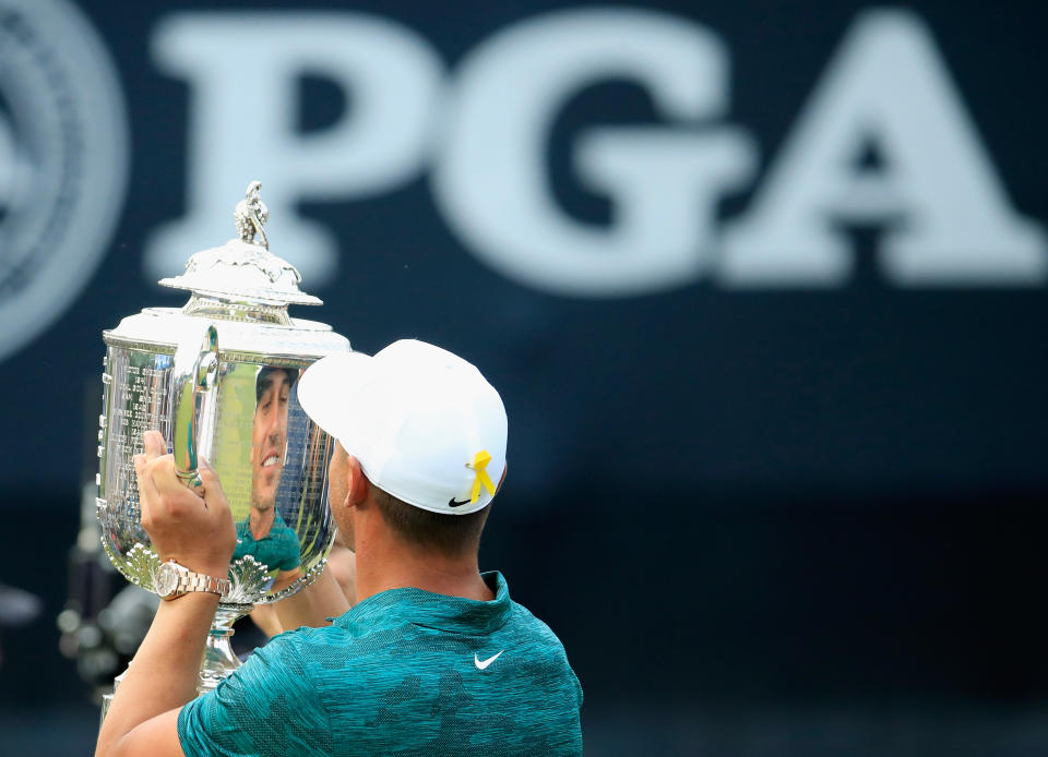 Brooks Koepka celebrates winning the 100th PGA Championship. (Getty)