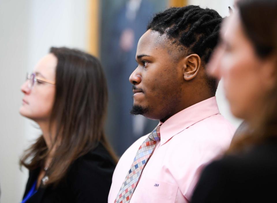 Devaunte Hill stands while the jury walks into the courtroom, waiting for the verdict at Justice A.A. Birch Building  in Nashville, Tenn., Tuesday, Jan. 31, 2023. Jury was still deliberating at this time. 