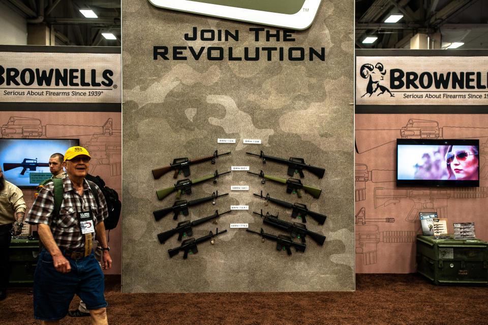 A man walks past a booth on the expo floor&nbsp;on Sunday.