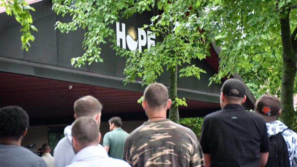 Attendees of the Hope Center Emergency Shelter groundbreaking wait for the event to begin on Wednesday, June 6, 2023 at the Hope Center Emergency Shelter in Lexington, Ky. The new additions include housing specifically for transitional clients and veterans and will cost $6.2 million.