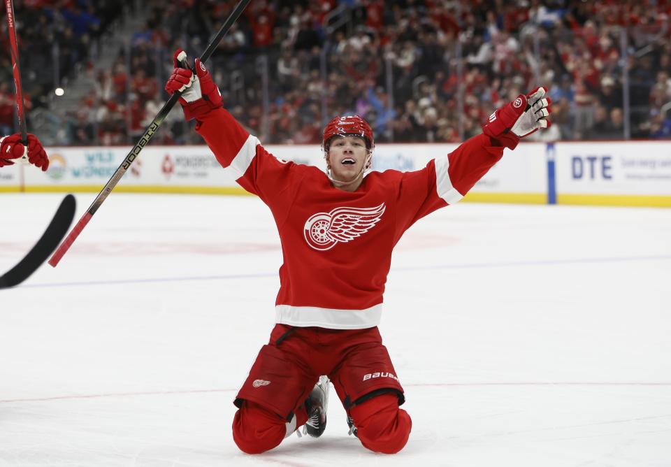 Detroit Red Wings left wing Lucas Raymond (23) celebrates after scoring against the Tampa Bay Lightning during the first period of an NHL hockey game Sunday, Jan. 21, 2024, in Detroit. (AP Photo/Duane Burleson)