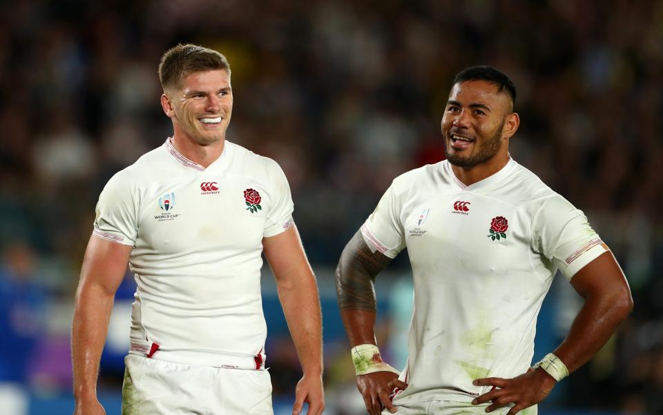 Owen Farrell and Manu Tuilagi of England enjoy a laugh during the Rugby World Cup 2019 Semi-Final match between England and New Zealand at International Stadium Yokohama - Francois Nel/World Rugby via Getty Images