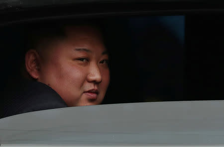 Kim Jong Un sits in his vehicle after arriving at the Dong Dang railway station, Vietnam, at the border with China, February 26. REUTERS/Athit Perawongmetha