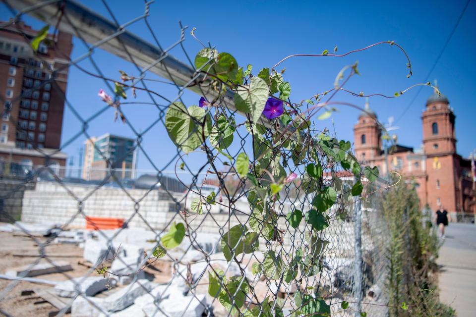 A property called 68 Haywood St., the empty lot across the street from the Harrah's Cherokee Center and better known as the "Pit of Despair," is used as a staging area for  construction along Haywood Street on Oct. 6, 2020.