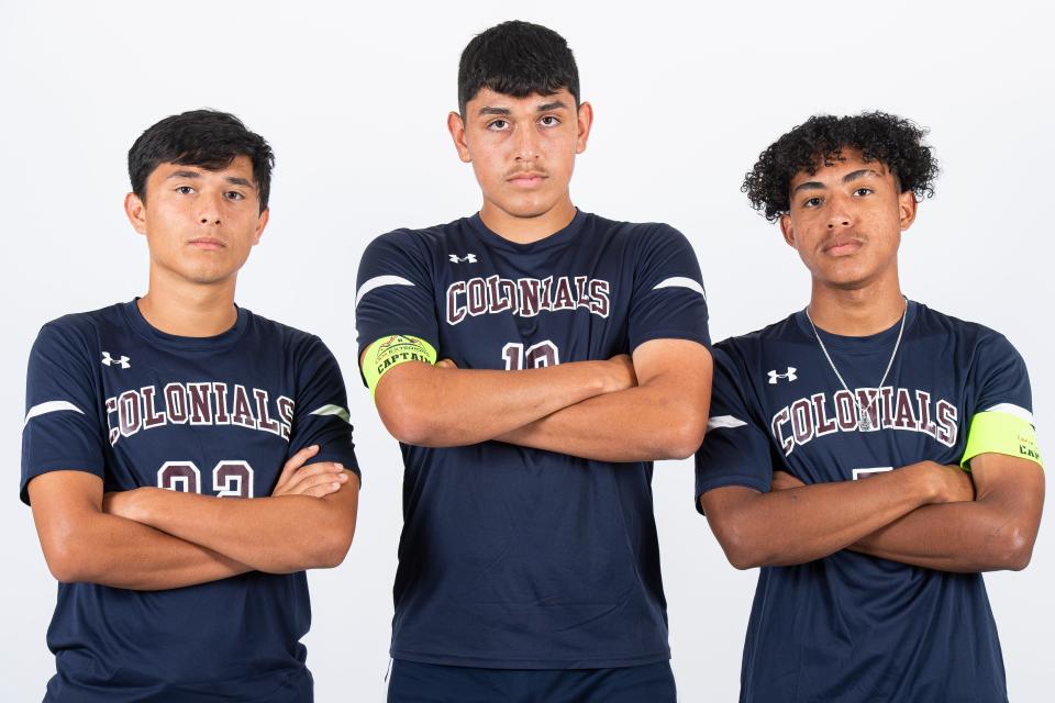 New Oxford soccer players Israel Felipe (32), Marcos Lua (10) and Harvin Flowers (7) pose for a photo during YAIAA fall sports media day on Thursday, August 3, 2023, in York.