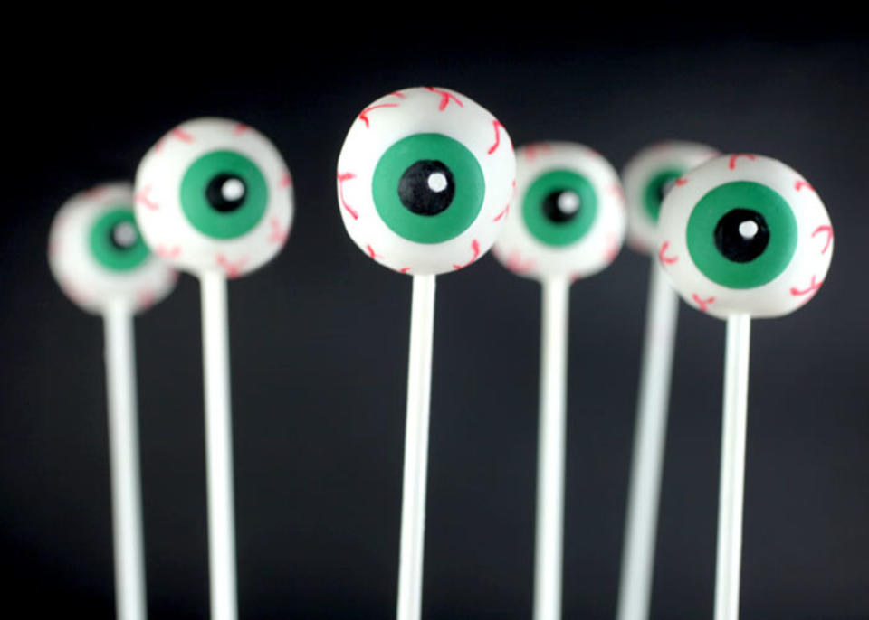 <p>Nothing could be quite as eye-catching as these Halloween cake pops. </p><p><strong>Get the recipe: </strong><a href="https://www.bakerella.com/eye-popping/" rel="nofollow noopener" target="_blank" data-ylk="slk:Eye Popping;elm:context_link;itc:0;sec:content-canvas" class="link ">Eye Popping</a></p>
