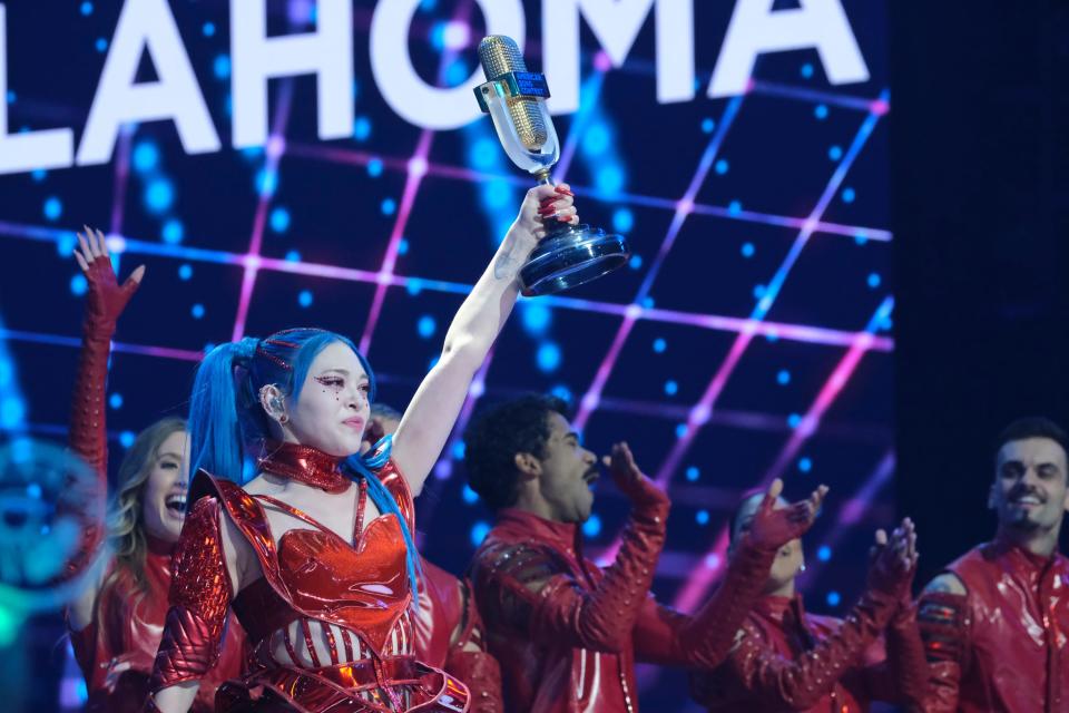 Oklahoma contestant AleXa, a rising K-Pop star who hails from Jenks, hoists her trophy after being named the first winner of "American Song Contest" on “The Live Grand Final” May 9.