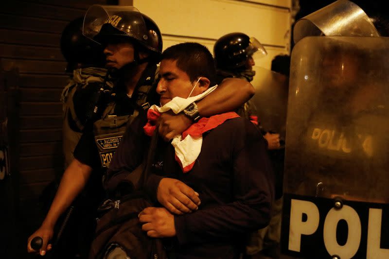 Protests despite a government proposal to bring forward elections, in Lima