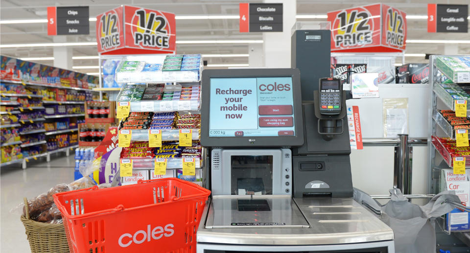 Cameras at Coles self service checkouts replay live footage back to customers. Source: Getty Images