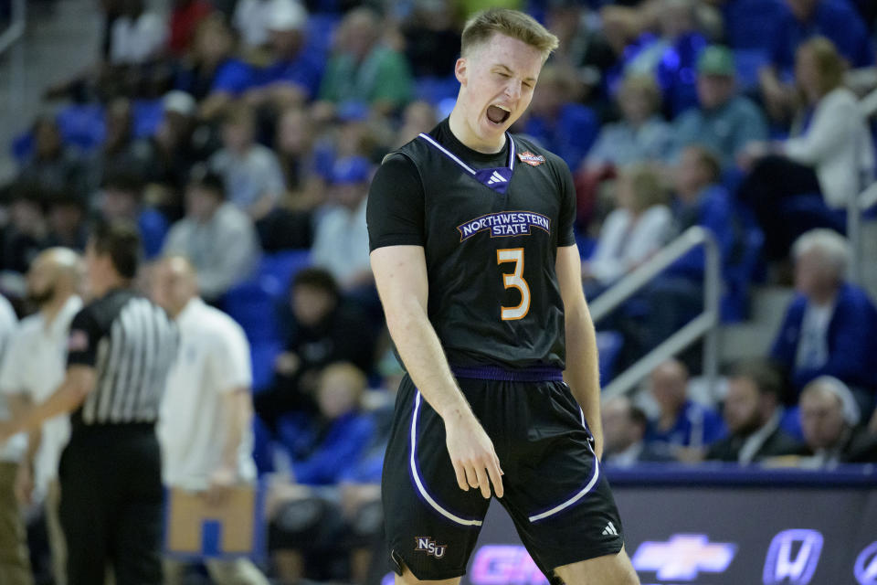 Northwestern State guard Isaac Haney (3) celebrates a three point basket against Texas A&M Corpus Christi during the first half an NCAA college basketball game in the finals of the Southland Conference men's tournament in Lake Charles, La., Wednesday, March 8, 2023. (AP Photo/Matthew Hinton)