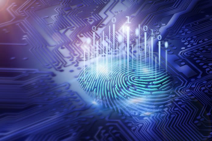 A digital fingerprint surrounded by circuitry