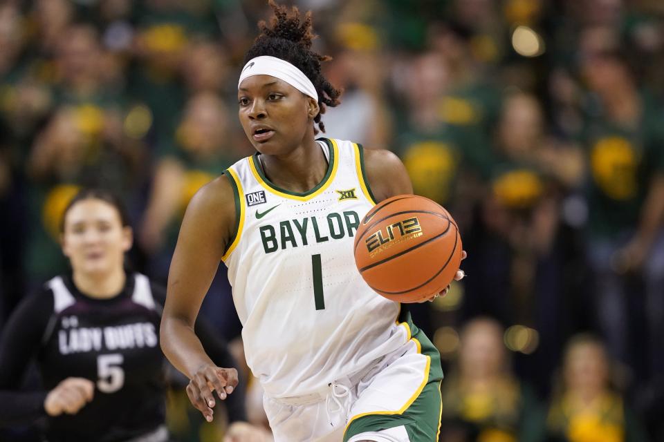 Baylor forward NaLyssa Smith (1) advances the ball against West Texas A&M in the second half of an exhibition NCAA college basketball game in Waco, Texas, Wednesday, Nov. 3, 2021. (AP Photo/Tony Gutierrez)