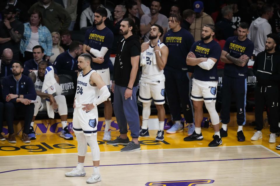 Memphis Grizzlies' Dillon Brooks (24) and the team's bench watch the action during overtime in Game 4 of a first-round NBA basketball playoff series against the Los Angeles Lakers Monday, April 24, 2023, in Los Angeles. The Lakers won 117-111. (AP Photo/Jae C. Hong)