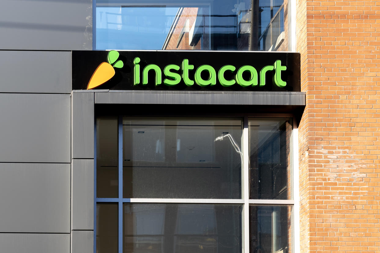 Instacart company sign shown on a building in Toronto.