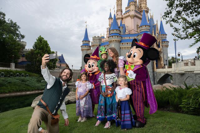 <p>Preston Mack/Disney</p> Thomas Rhett and family dressed up at Disney World