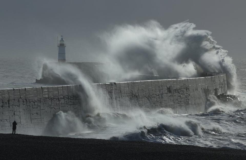 Large waves hit the seawall and harbour during Storm Isha, at Newhaven, southern Britain (REUTERS)