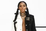 <p>Monae embellished her braided pigtails with real . hair bows and Chanel brooches to attend the fashion house's AW20 show in Paris.</p>