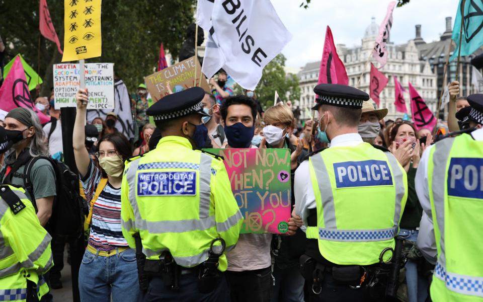 An Extinction Rebellion protest in Parliament Square   - Getty Images Europe 