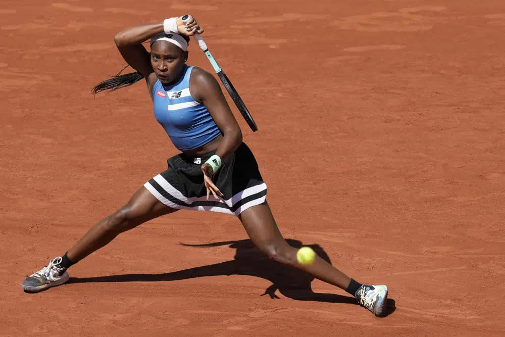 Coco Gauff of the U.S. plays a shot against Russia’s Mirra Andreeva during their third round match of the French Open tennis tournament at the Roland Garros stadium in Paris, Saturday, June 3, 2023. (AP Photo/Christophe Ena)