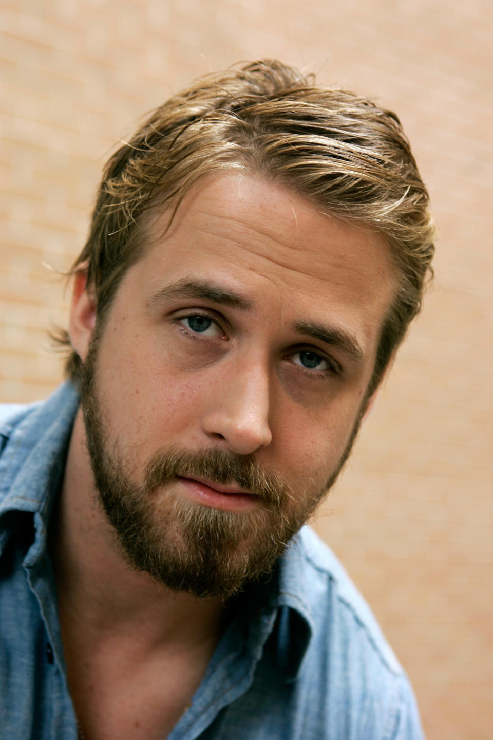 FILE - This sept. 10, 2007 file photo shows actor Ryan Gosling posing during the Toronto International Film Festival in Toronto. Genealogists at Ancestry.com say they’ve discovered teen idol Justin Bieber is a distant cousin of movie star Ryan Gosling and singer Avril Lavigne. Their family link dates back to some of Quebec’s earliest settlers 400 years ago, the Utah-based company said Thursday. (AP Photo/Carolyn Kaster, file)