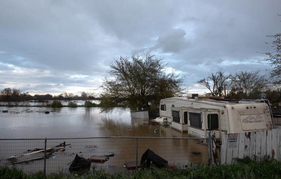 Catfish Camp RV park has been flooded by the San Joaquin River in Crow Landing, Calif., Wednesday, March 22, 2023.