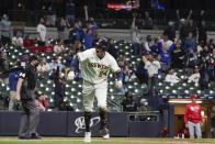 Milwaukee Brewers' Avisail Garcia hits a two-run home run during the eighth inning of a baseball game against the St. Louis Cardinals Wednesday, May 12, 2021, in Milwaukee. (AP Photo/Morry Gash)