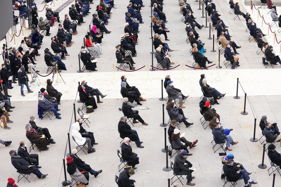 Guests attend the inauguration of Joe Biden as the 46th President of the United States on the West Front of the U.S. Capitol. (Kevin Lamarque/Reuters)