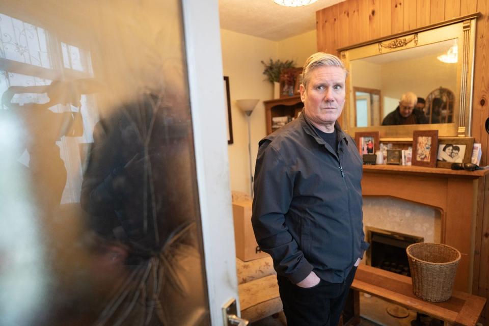 Starmer, who met residents hit by flooding in Loughborough, said the government must ‘get on’ with compensation (PA)