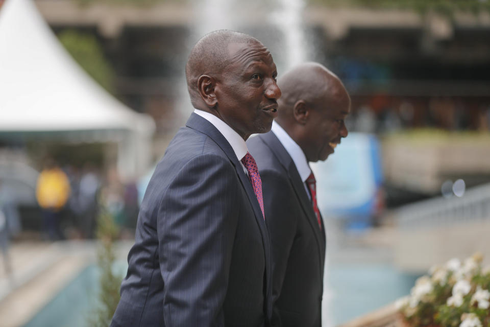 Kenya President William Ruto, left, and Deputy Vice President, Rigathi Gachagua arrive at Kenyatta International Convention Centre (KICC) for the Africa Climate Summit, in Nairobi, Kenya, Monday, Sept. 4, 2023. The first African Climate Summit is opening with heads of state and others asserting a stronger voice on a global issue that affects the continent of 1.3 billion people the most, even though they contribute to it the least. (AP Photo/Brian Inganga)