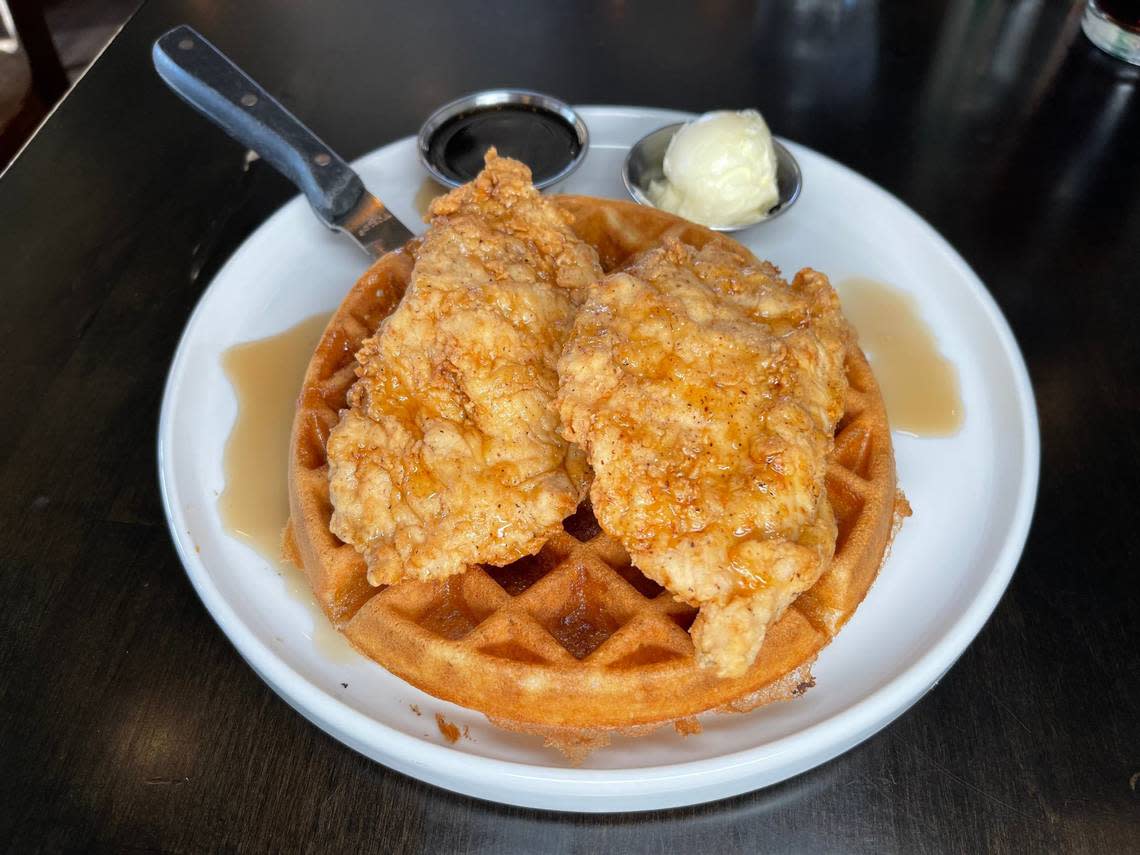 East End Tap and Table’s buttermilk waffle with two large mildly seasoned fried chicken flats.