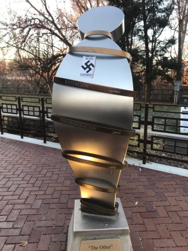 The freedom spiral at the Wassmuth Center for Human Rights, intended to show how hateful language can lead to discrimination, violence and attempts to eliminate disadvantaged groups, had a swastika sticker pasted to it early Tuesday morning.