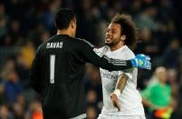 Football Soccer - FC Barcelona v Real Madrid - La Liga - Camp Nou, Barcelona - 2/4/16 Real Madrid's Keylor Navas and Marcelo celebrate after the game Reuters / Albert Gea Livepic