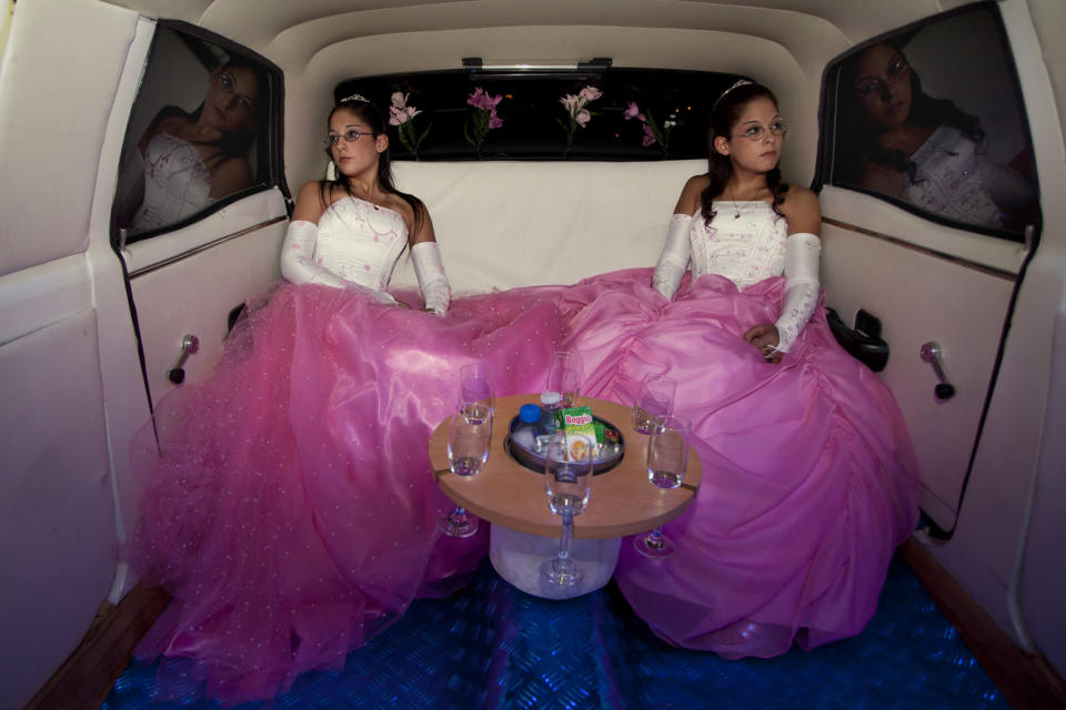 The twins Laura and Beln on the day of their fifteenth birthday celebration. In Latin America, the celebration of the fifteenth birthday of a teenager is very important because it marks the transition from childhood to maturity. (Myriam Meloni, Italy, Finalist, Arts and Culture, Professional Competition, 2013 Sony World Photography Awards) <br> <br> <a href="http://worldphoto.org/about-the-sony-world-photography-awards/" rel="nofollow noopener" target="_blank" data-ylk="slk:Click here to see the full shortlist at World Photography Organisation;elm:context_link;itc:0;sec:content-canvas" class="link ">Click here to see the full shortlist at World Photography Organisation</a>