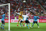 GDANSK, POLAND - JUNE 18: Iker Casillas of Spain challenges Vedran Corluka of Croatia during the UEFA EURO 2012 group C match between Croatia and Spain at The Municipal Stadium on June 18, 2012 in Gdansk, Poland. (Photo by Michael Steele/Getty Images)