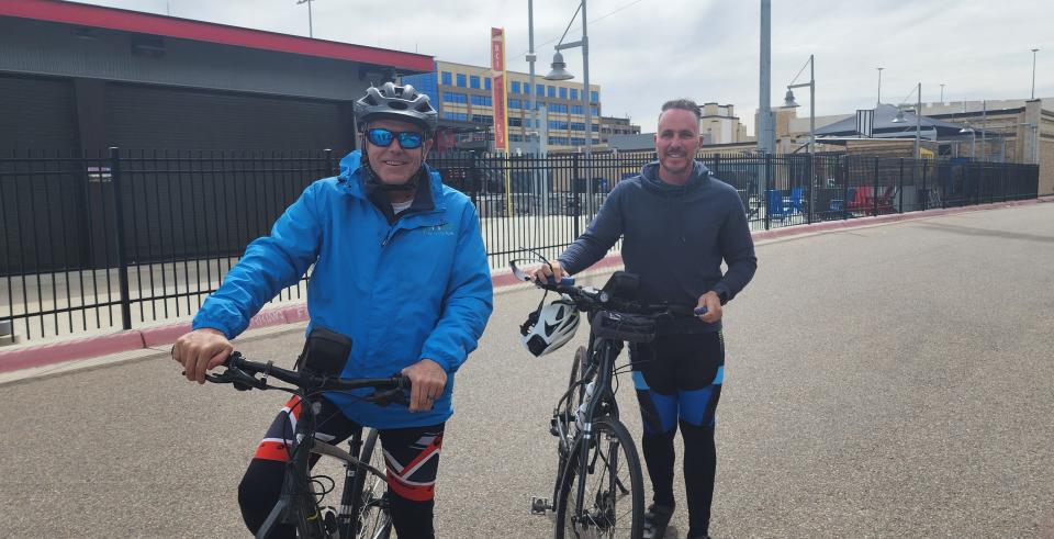 Ken Craft, left, and Rowan Vansleve, the founder and president of Hope the Mission, speak about their bike ride across the nation during their visit Monday at Amarillo City Hall.