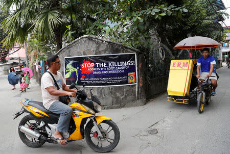 A banner opposing drug related killings is pictured along a street in Barangay Bagong Silangan, Quezon City, Metro Manila, in the Philippines November 22, 2017. REUTERS/Erik De Castro