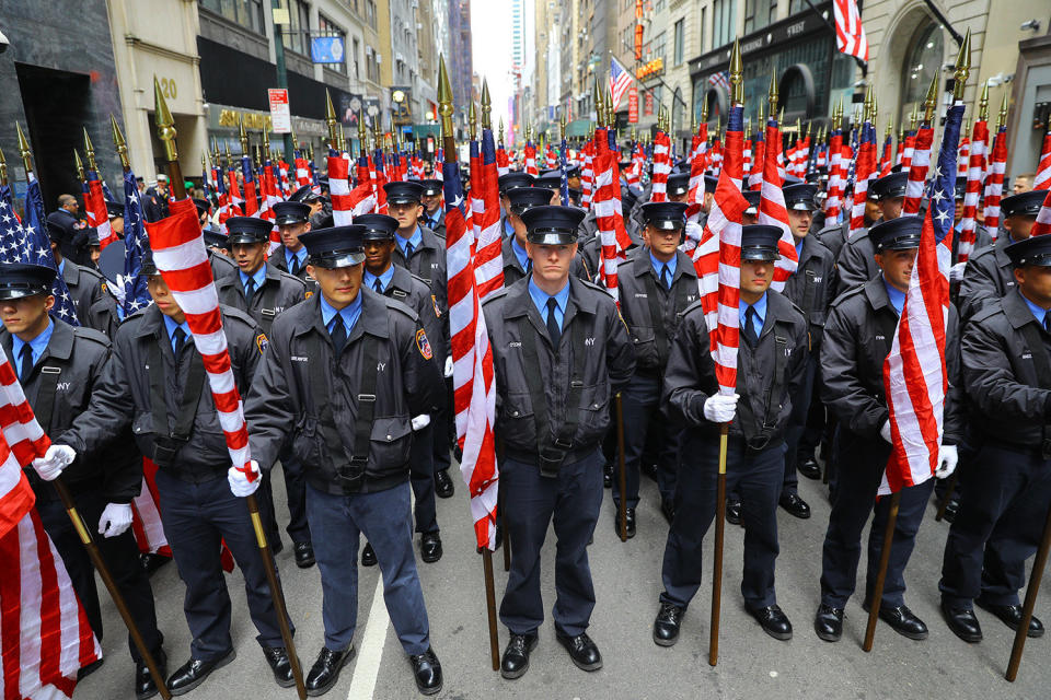 Members of the FDNY Color Guard are prepared to march in the St. Patrick's Day Parade, March 16, 2019, in New York. (Photo: Gordon Donovan/Yahoo News) 