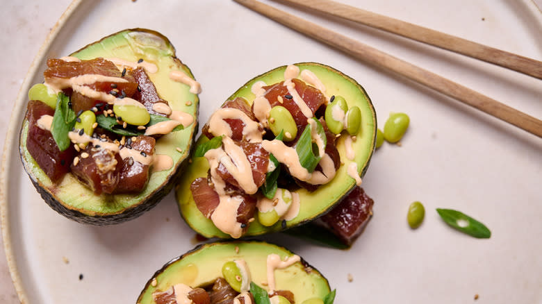 tuna stuffed avocado on plate