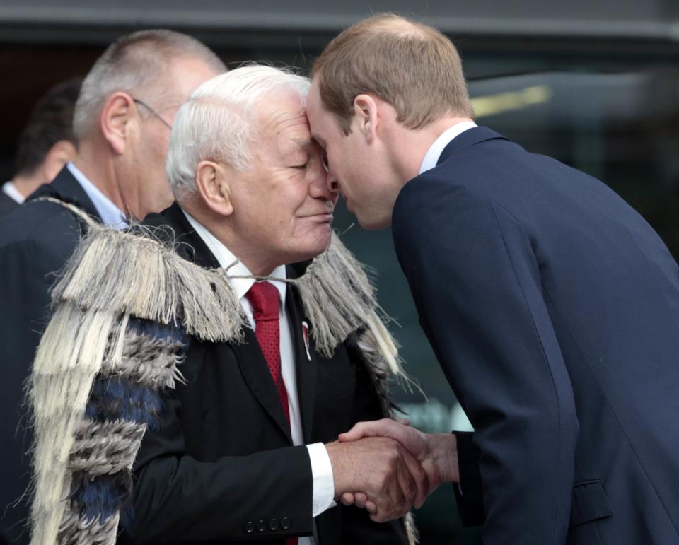 Britain's Prince William receives a "hongi", a traditional Maori greeting, from Henare Rakiihia Tau during a welcoming event in Christchurch