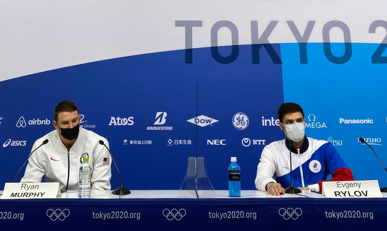 Ryan Murphy and Evgeny Rylov attend an awkward news conference together after the men's 200m backstroke. (Yahoo Sports)